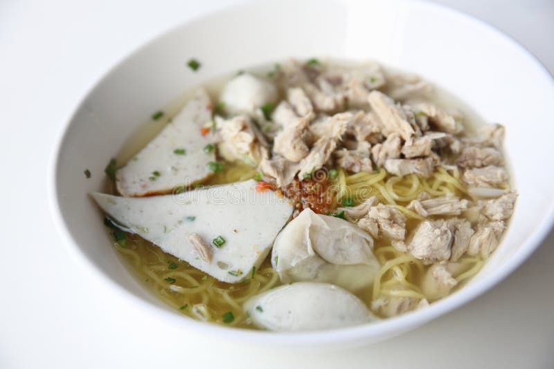 egg noodle with fishball on a bowl. egg noodle with fishball on a bowl